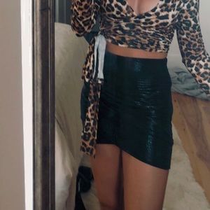 Black snakeskin mini skirt